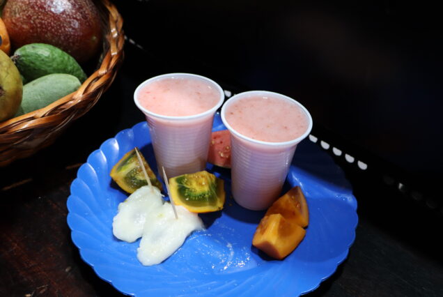 - Tour group tasting exotic Colombian fruits at local market