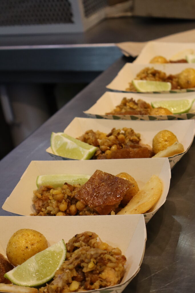 Lechona served during a Bogotá food tour experience
